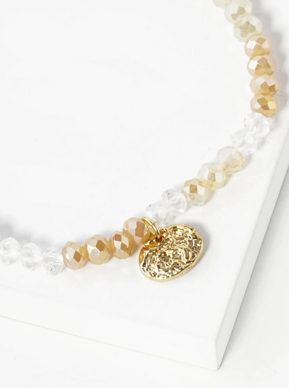 Faceted Glass Beaded Ombre Stretch Bracelet With Oval Metal Charm