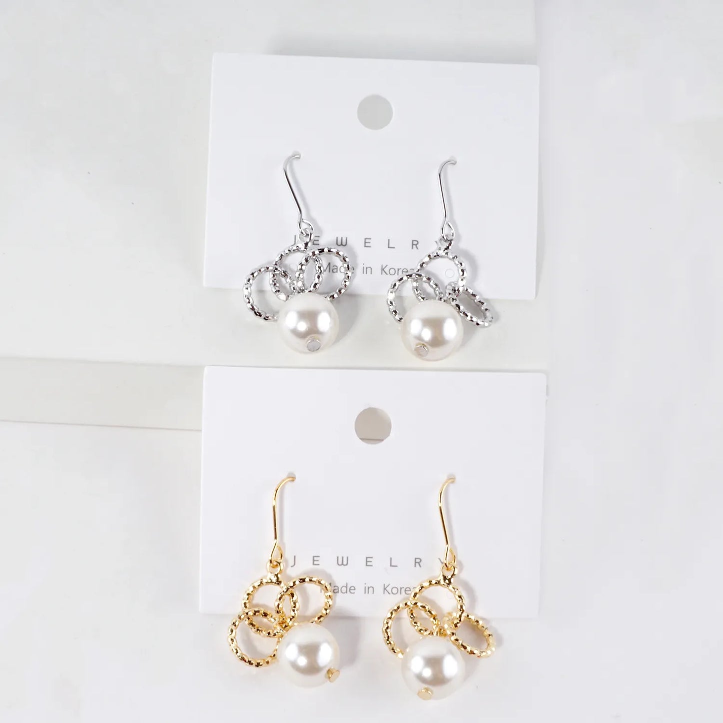 Glass Pearl And Brass Ring Cluster Drop Earrings