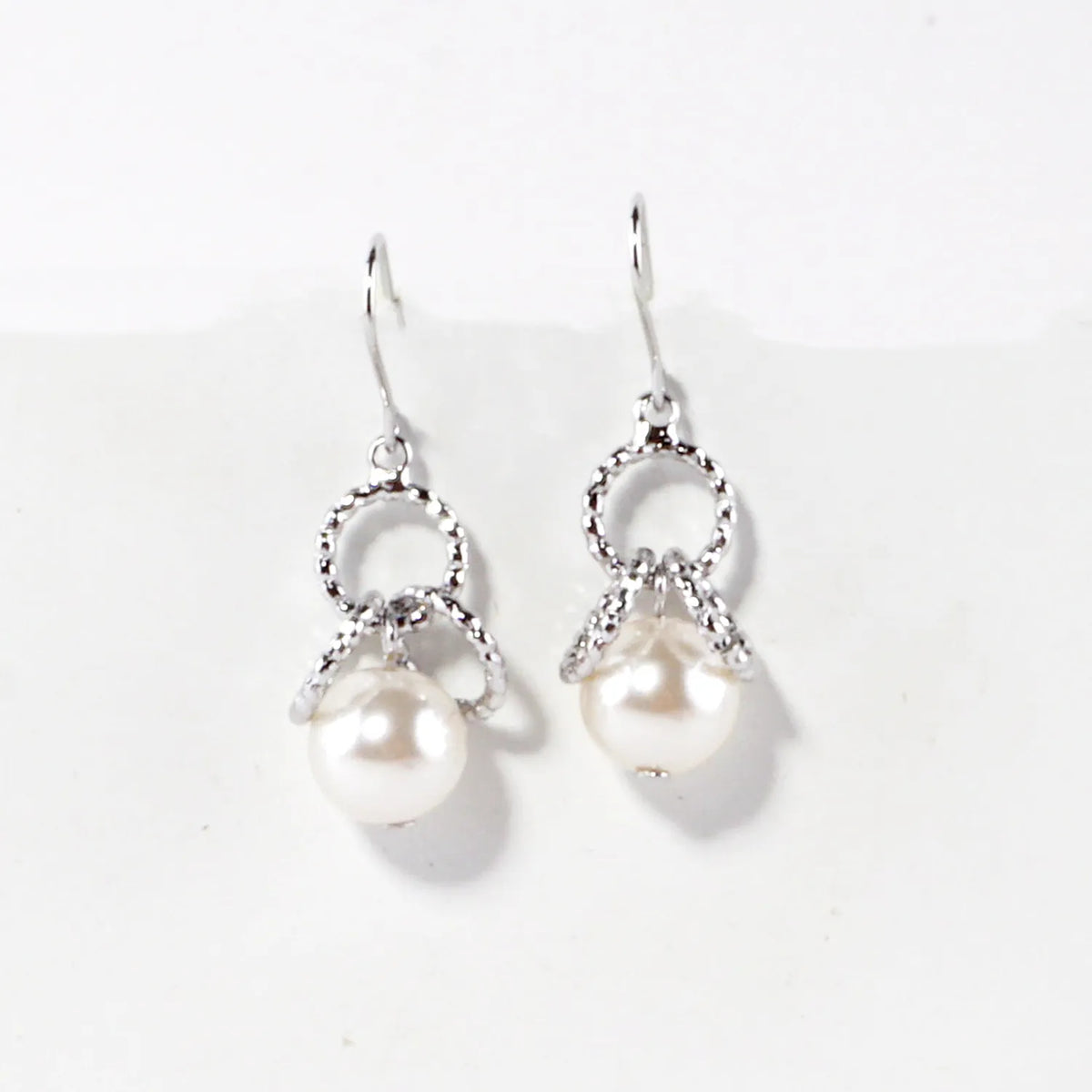 Glass Pearl And Brass Ring Cluster Drop Earrings