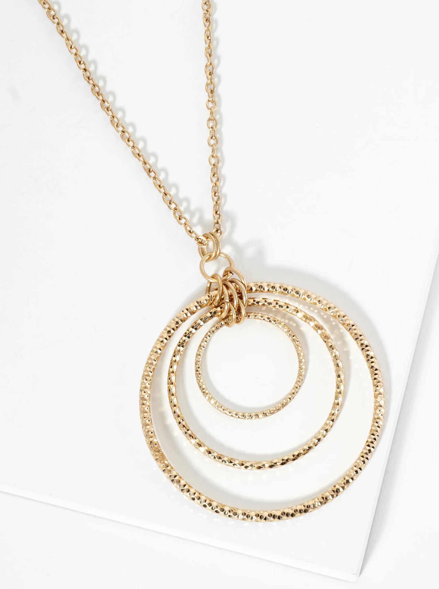 Graduated Sparkling Textured Circle Pendant 30 Inch Long Necklace