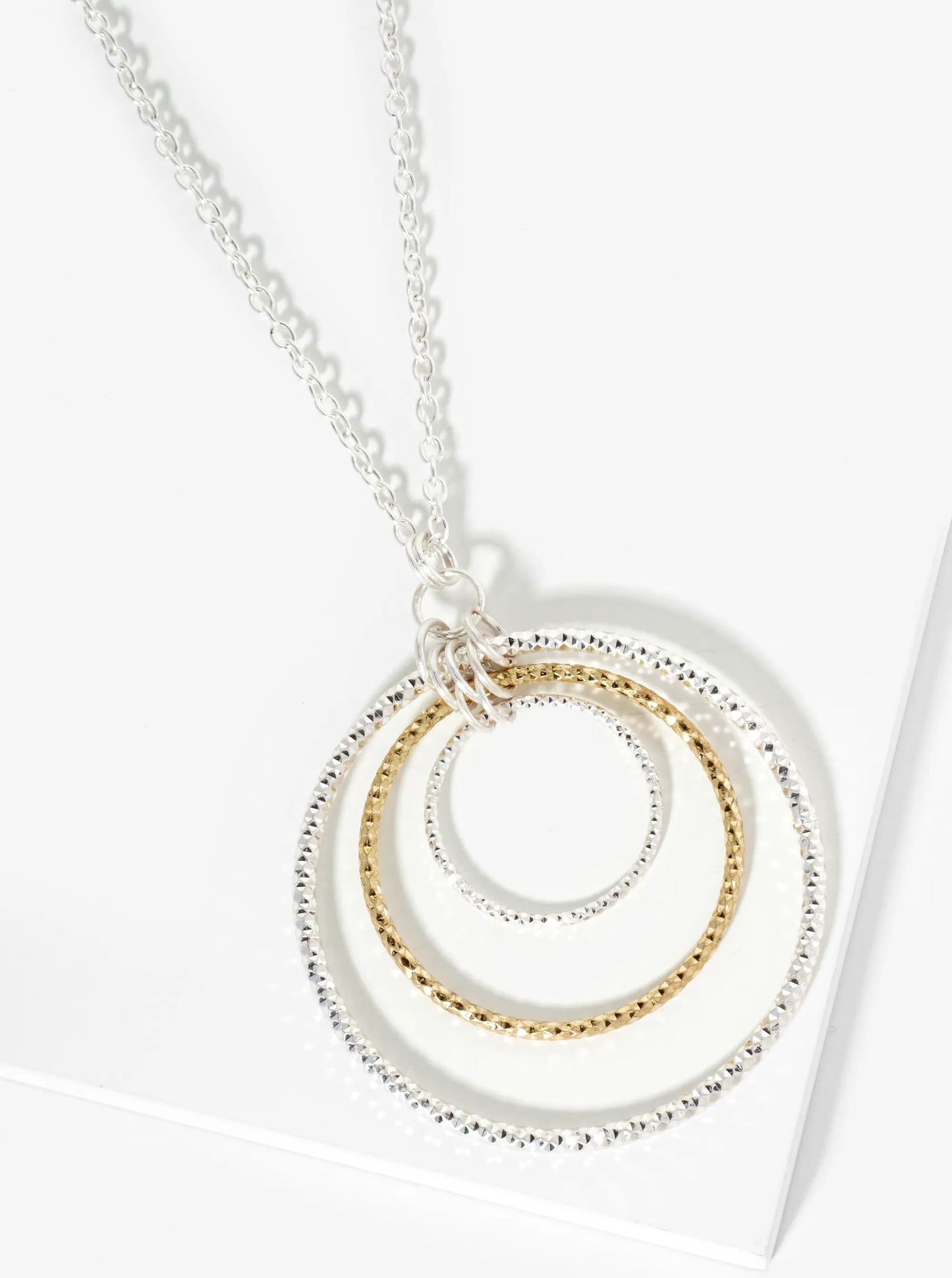 Graduated Sparkling Textured Circle Pendant 30 Inch Long Necklace