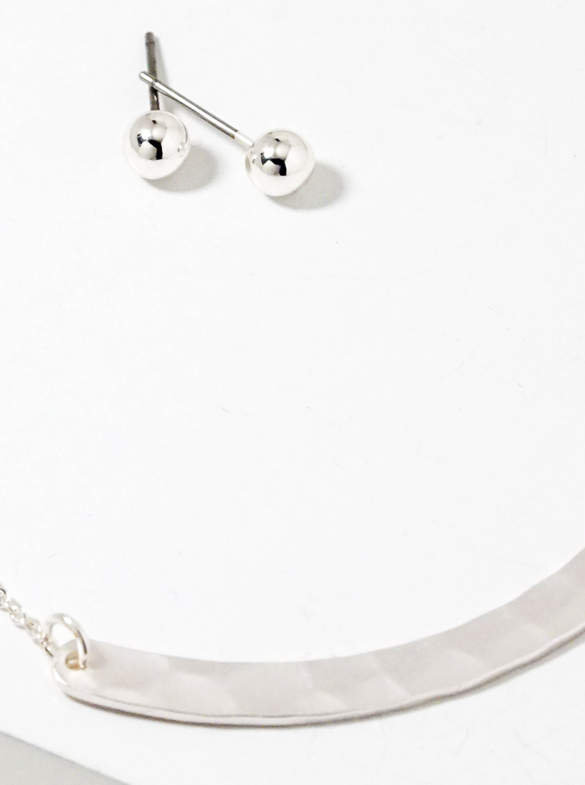 Hammered Brass Curved Bar Pendant Necklace