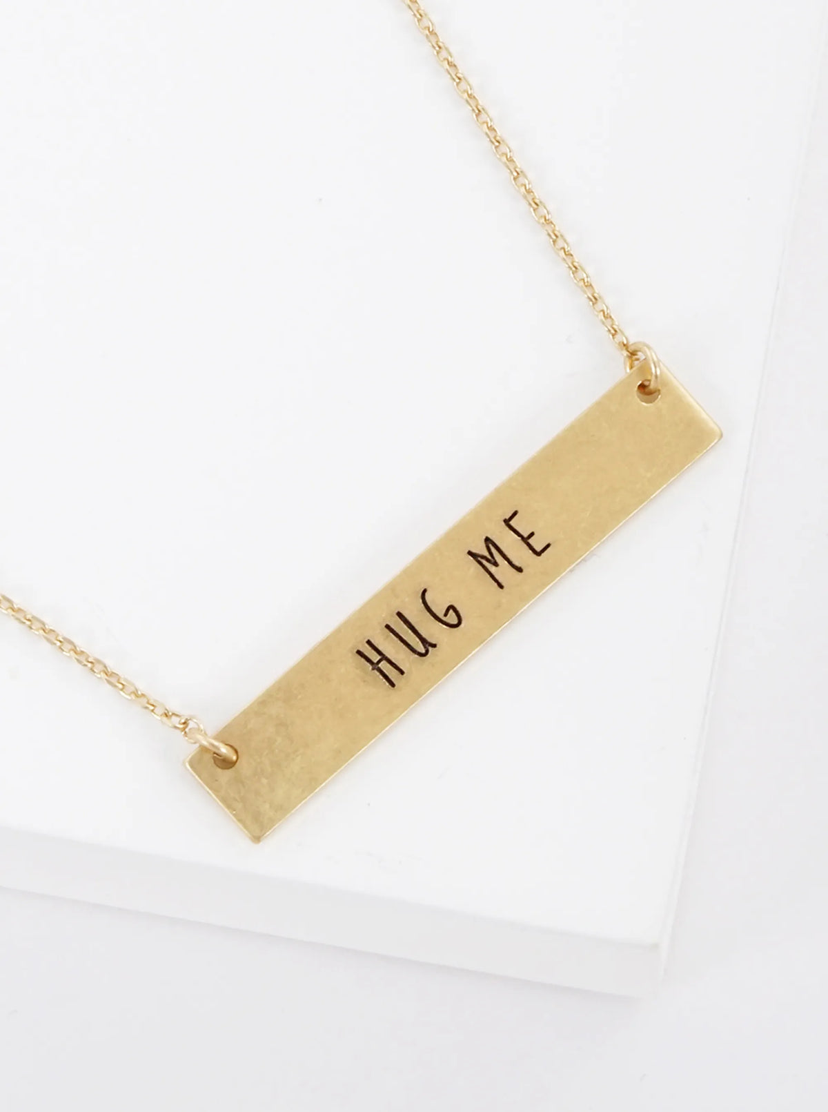 Hug Me Engraved Horizontal Bar Pendant Necklace