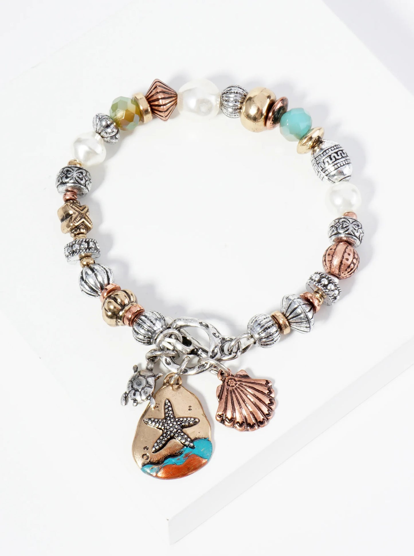 Intricately Patterned Beads Stretch Bracelet With Sea Life Charms