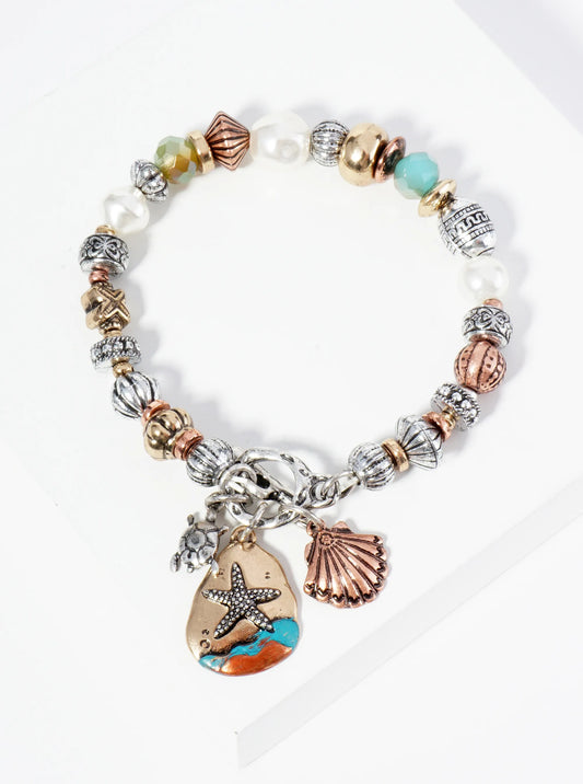 Intricately Patterned Beads Stretch Bracelet With Sea Life Charms