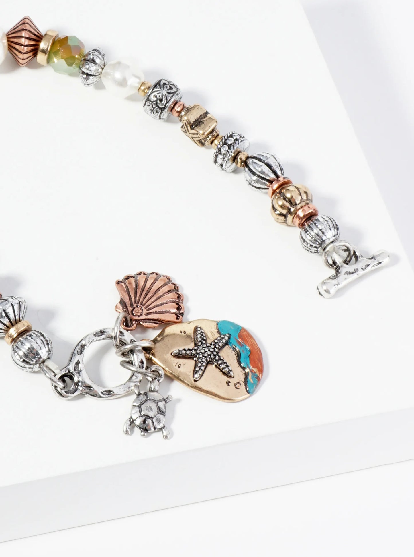 Intricately Patterned Beads Stretch Bracelet With Sea Life Charms