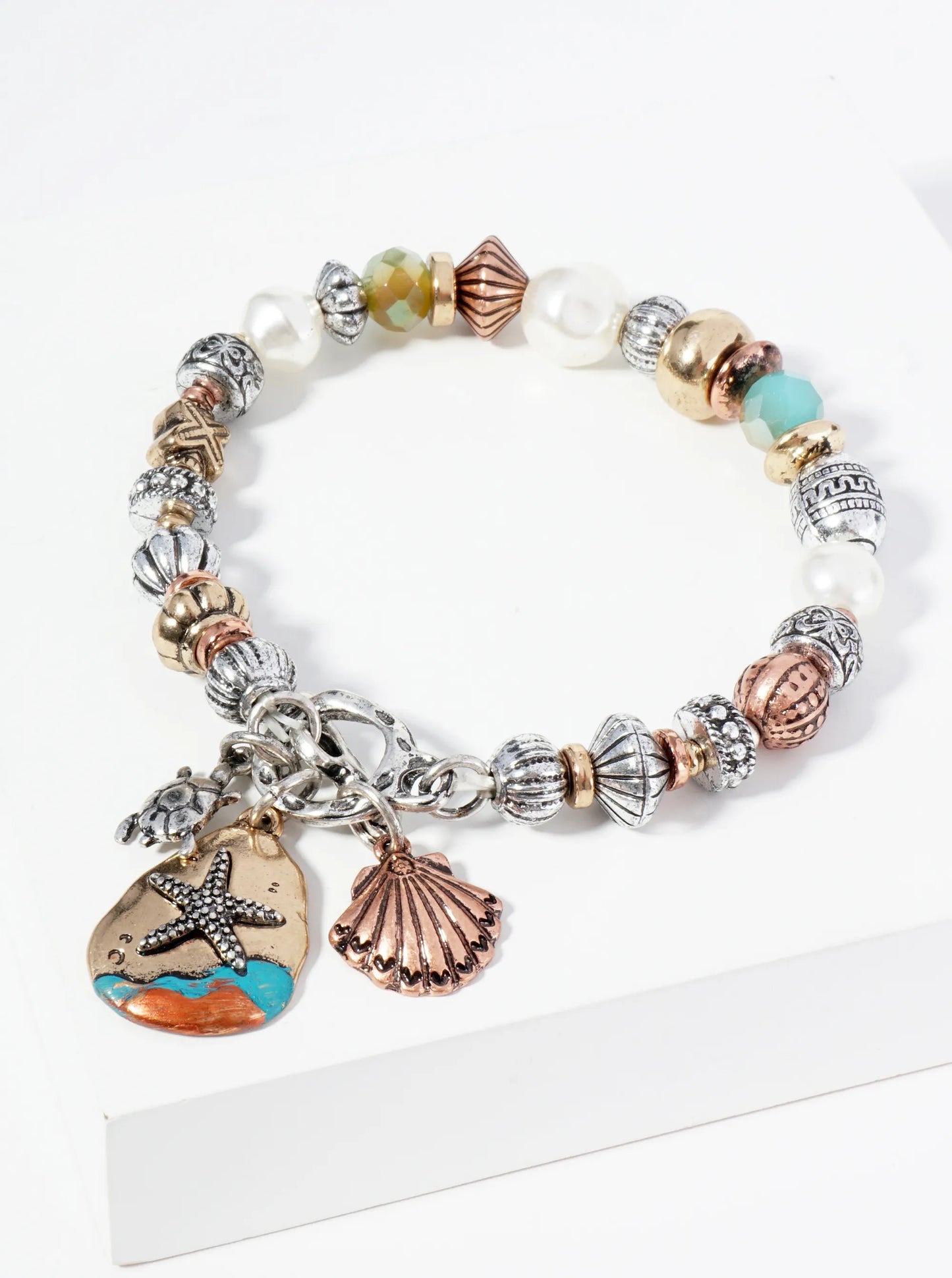 Intricately Patterned Beads Stretch Bracelet With Sea Life Charms