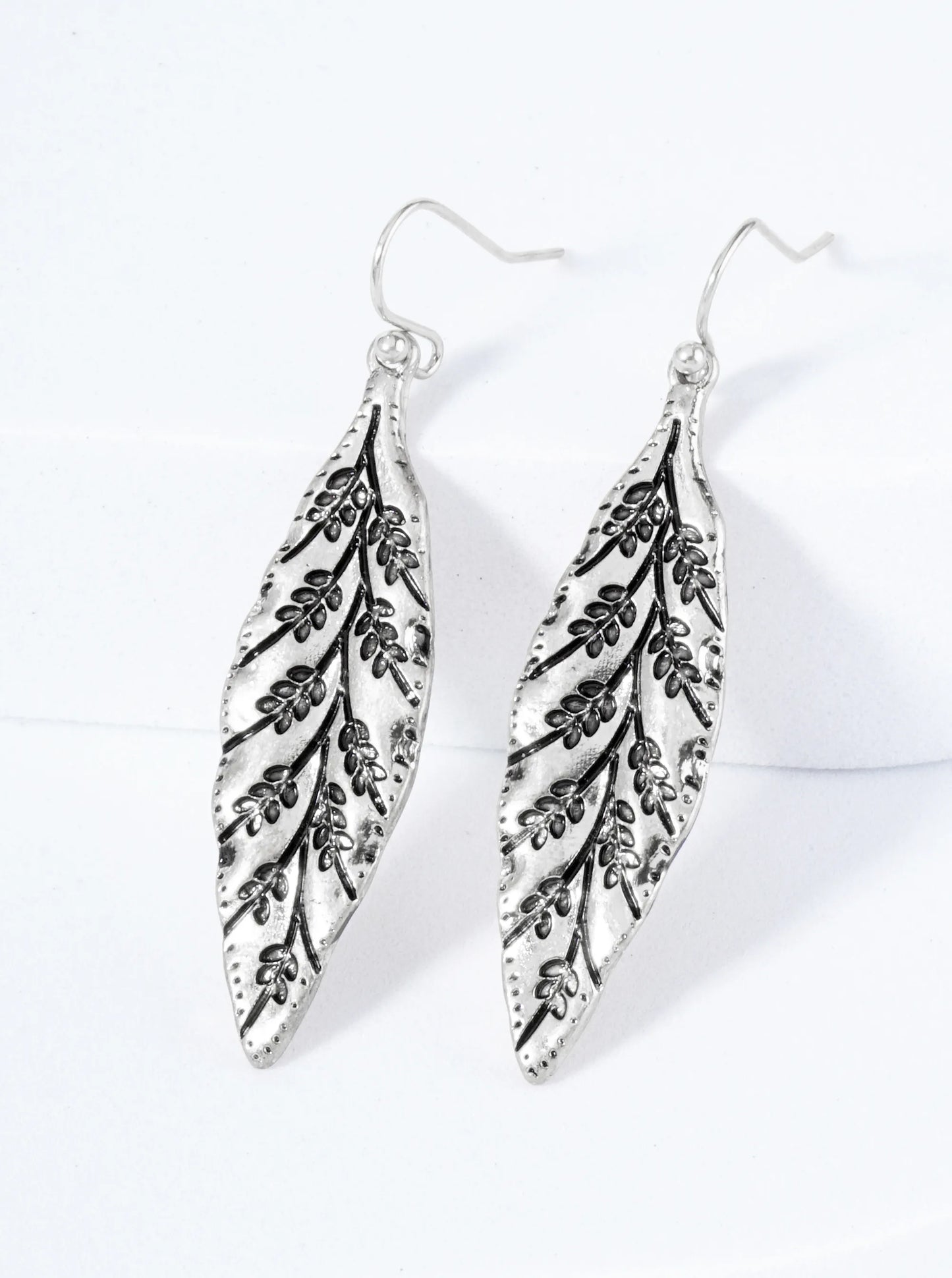 Leaf Shaped Dangle Earrings With Engraved Leaf Inside