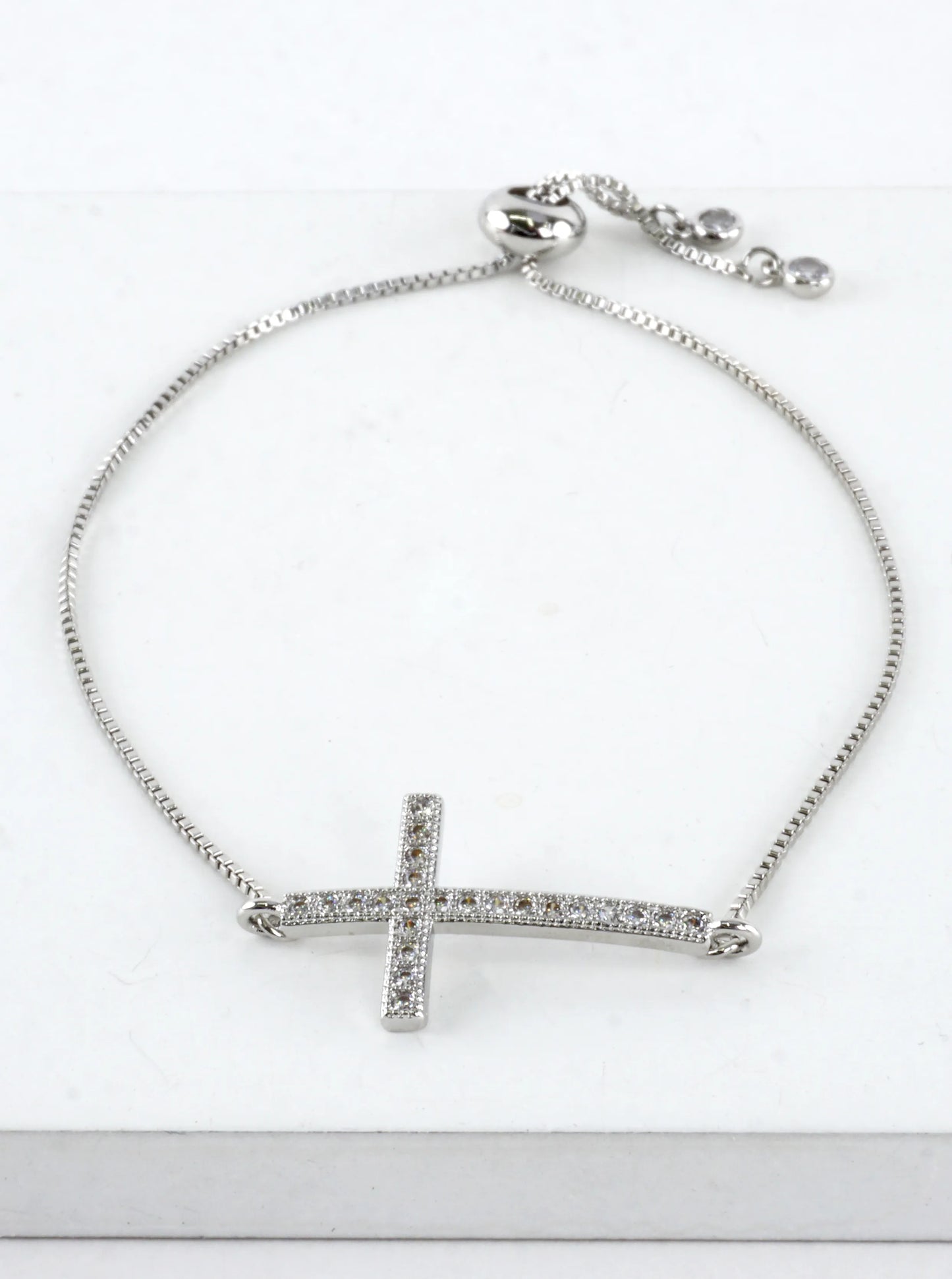 CZ Pave Cross Horizontal Bolo Pull Tie Bracelet