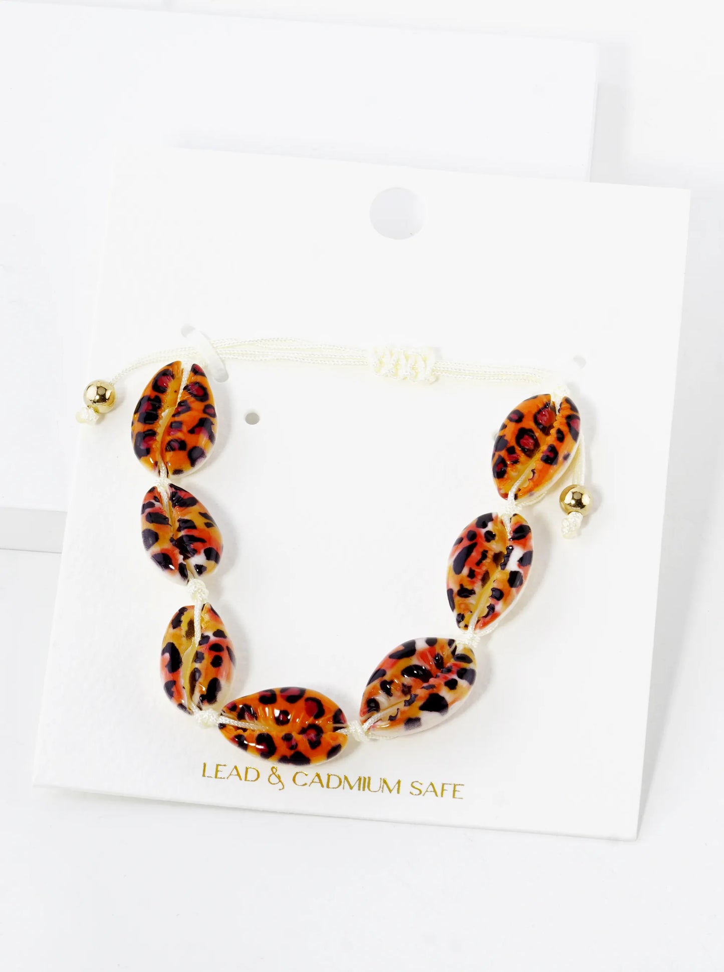Multi Patterned Cowrie Shell Pull-Tie Bracelet