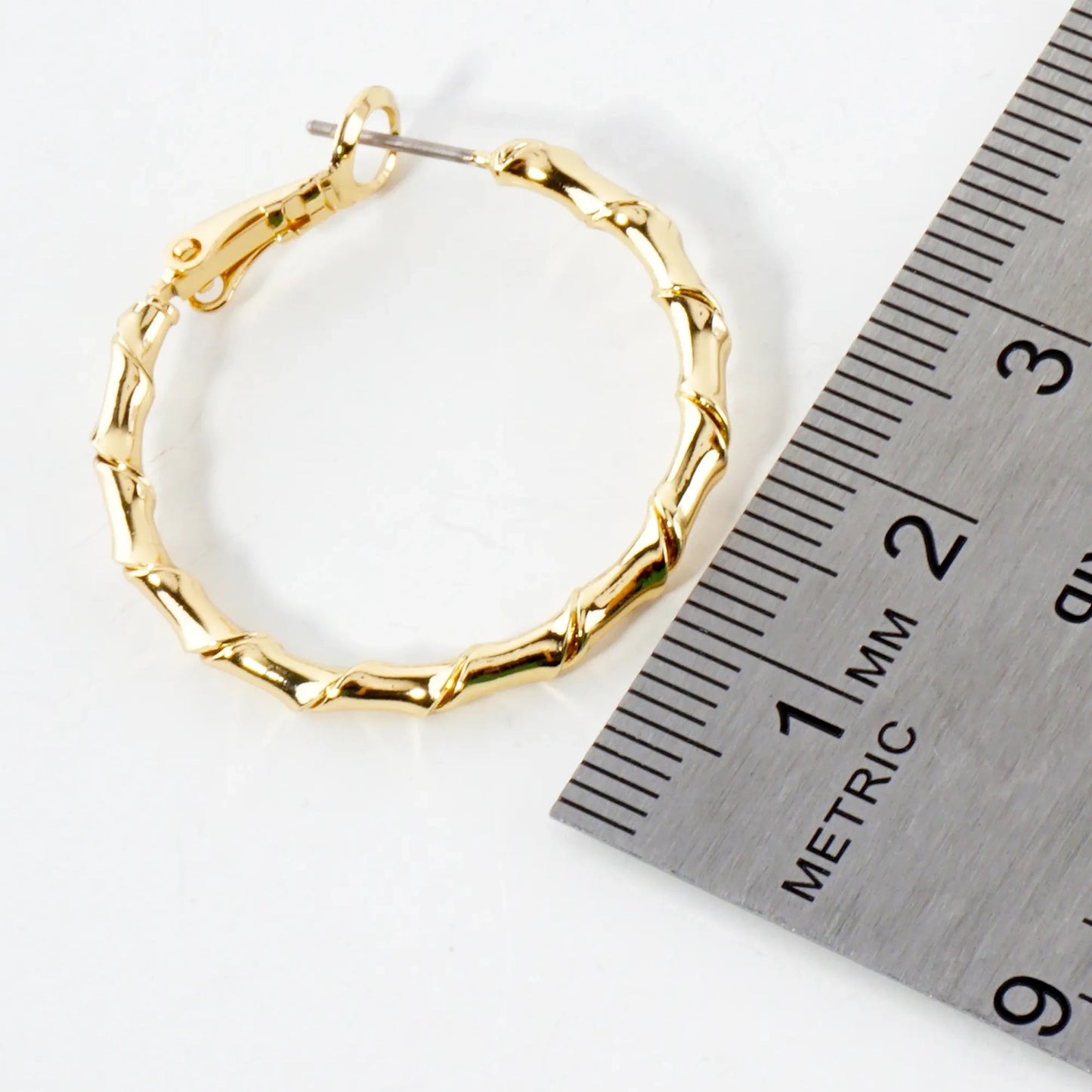 Polished Brass 30mm Twisted Design Detailed Omega-Back Hoop Earrings