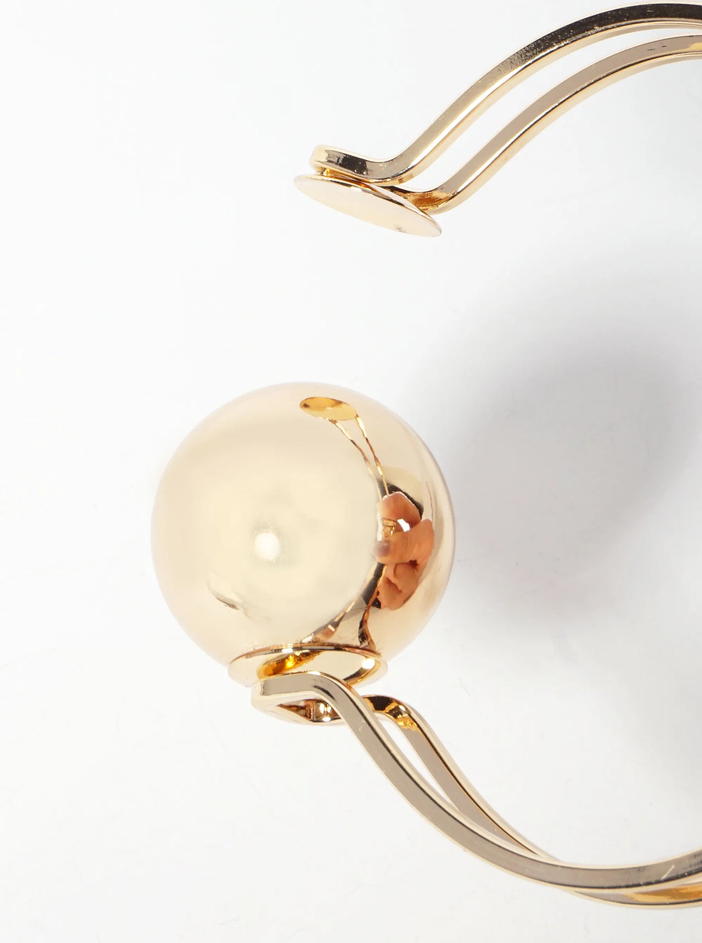Polished Metal 1-inch Hollow Ball Accent Spring Hinged Bangle Bracelet