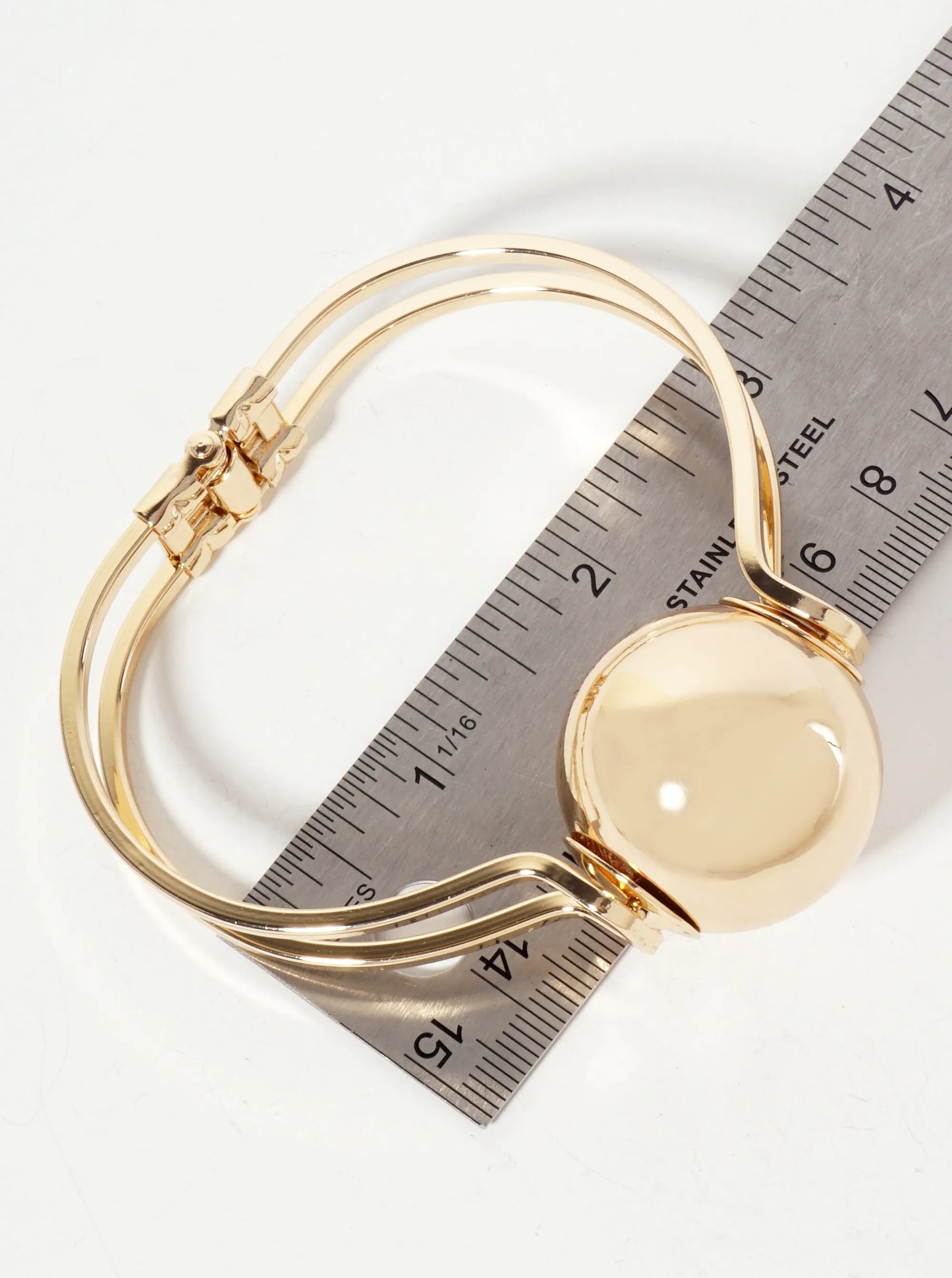 Polished Metal 1-inch Hollow Ball Accent Spring Hinged Bangle Bracelet