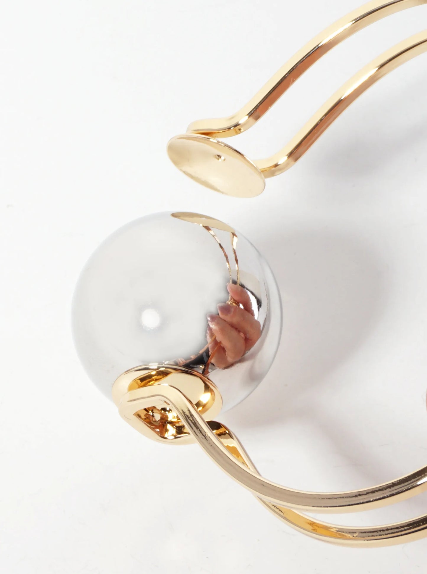 Polished Metal 1-inch Hollow Ball Accent Spring Hinged Bangle Bracelet