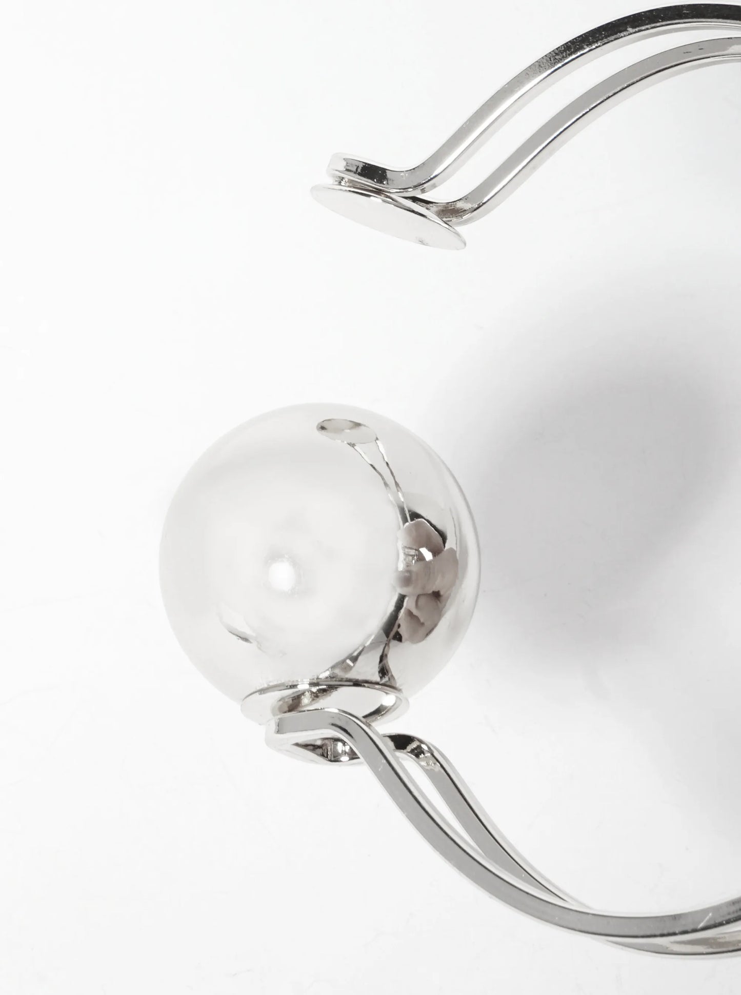 Polished Metal 1-inch Hollow Ball Accent Spring Hinged Bangle Bracelet