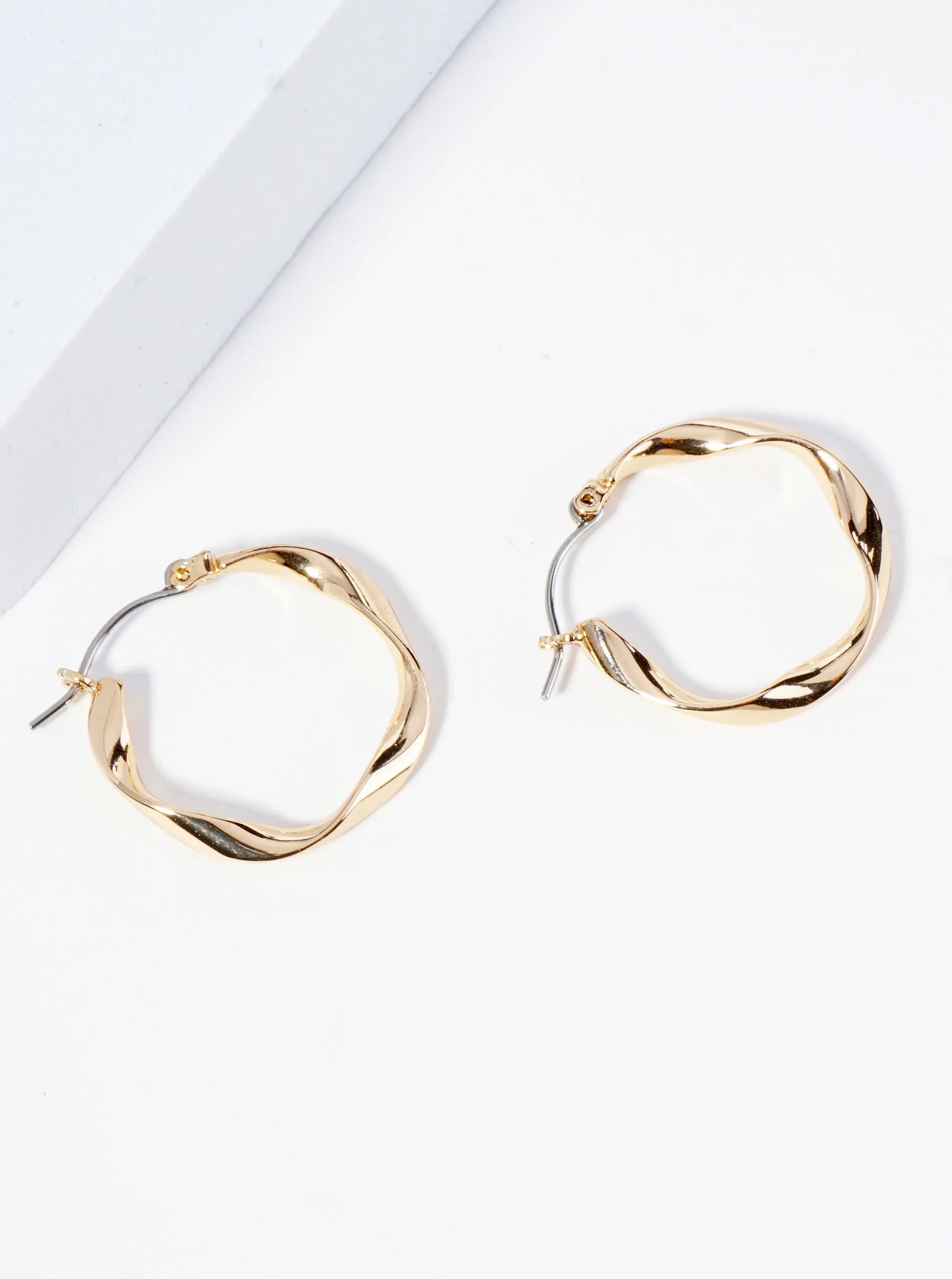 Polished Metal 25mm Twist Hoop Earrings