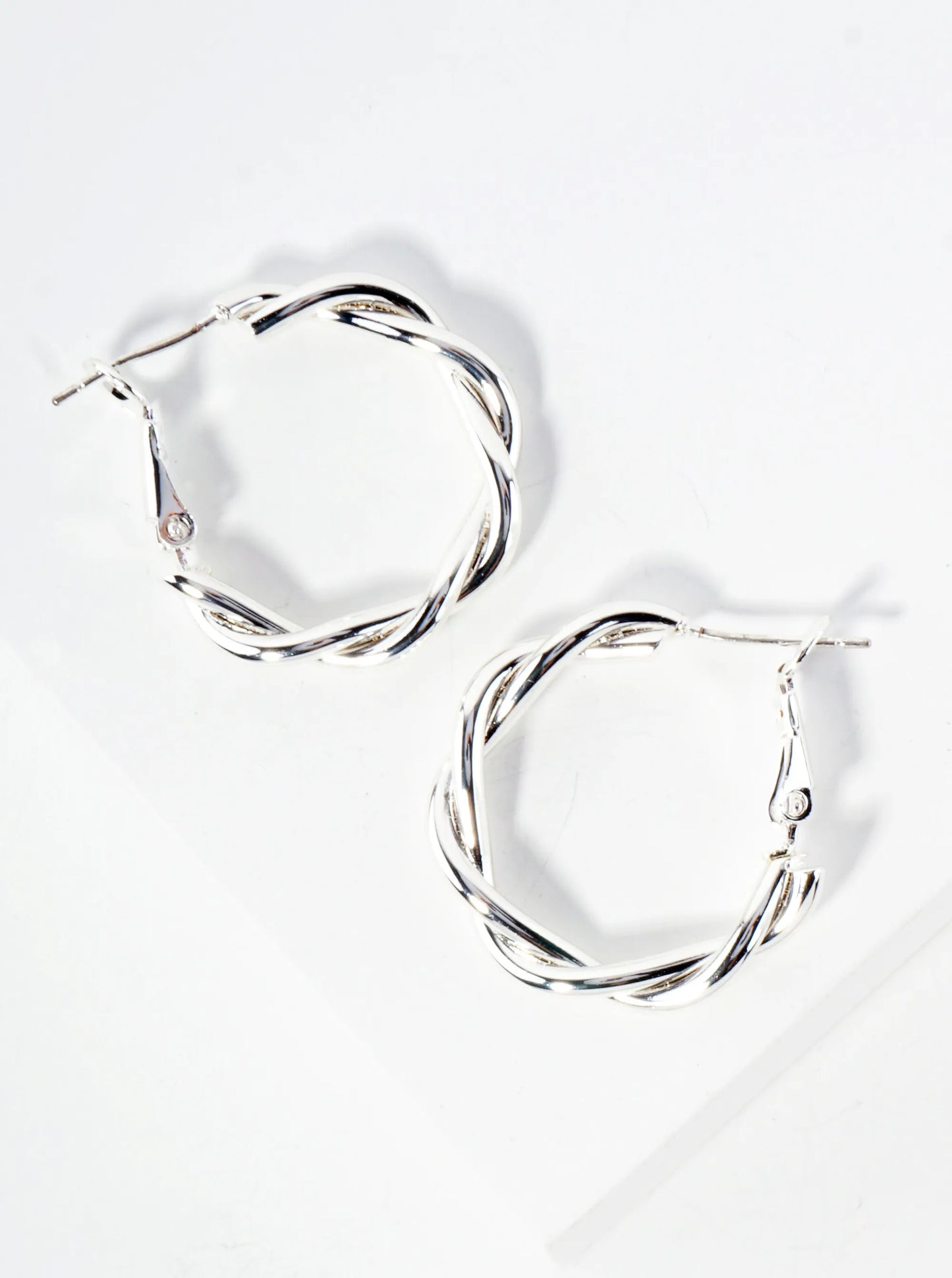 Polished Metal 25mm Twist Omega-Back Hoop Earrings