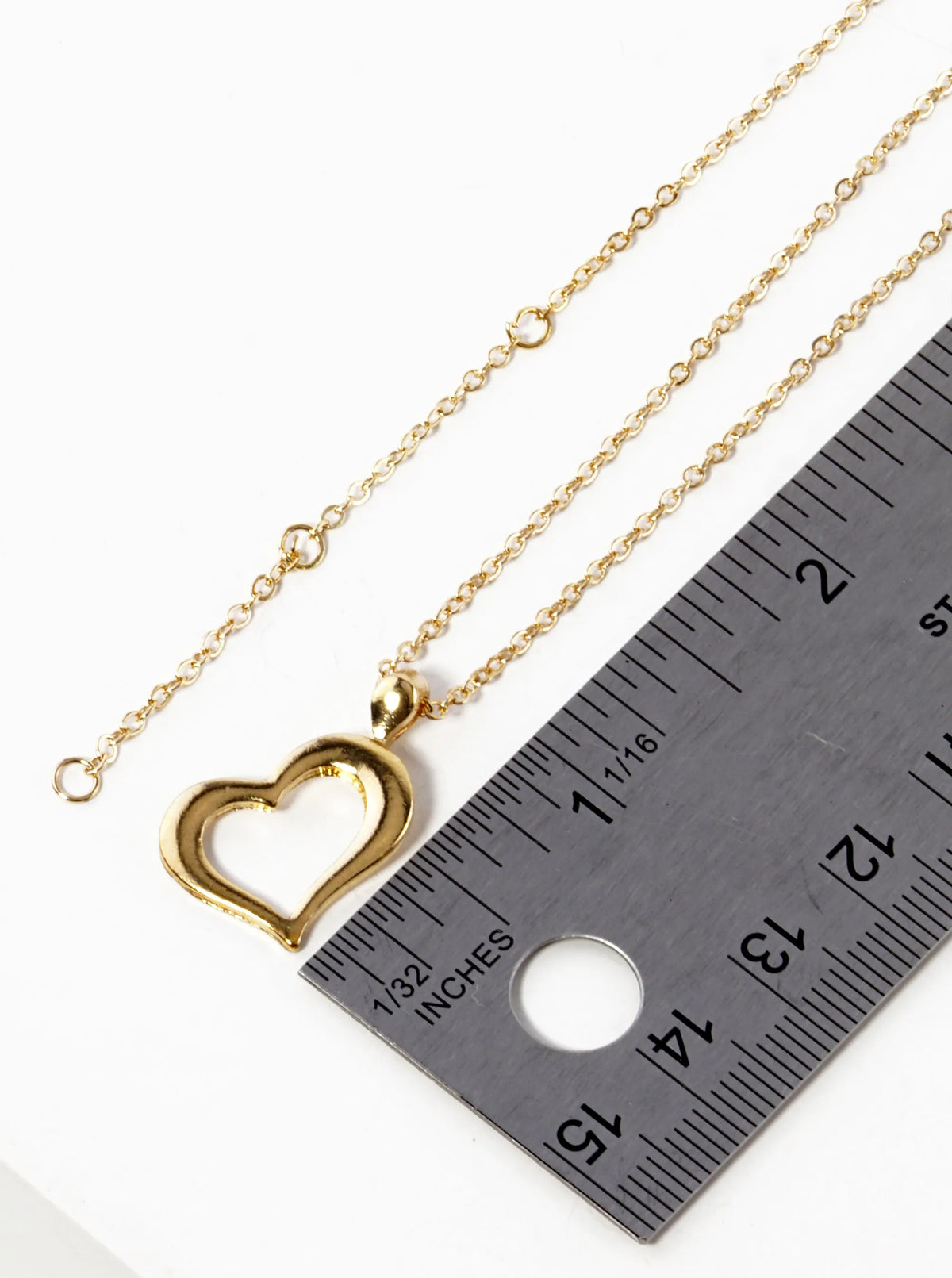 Polished Metal Sideways Heart Pendant Necklace