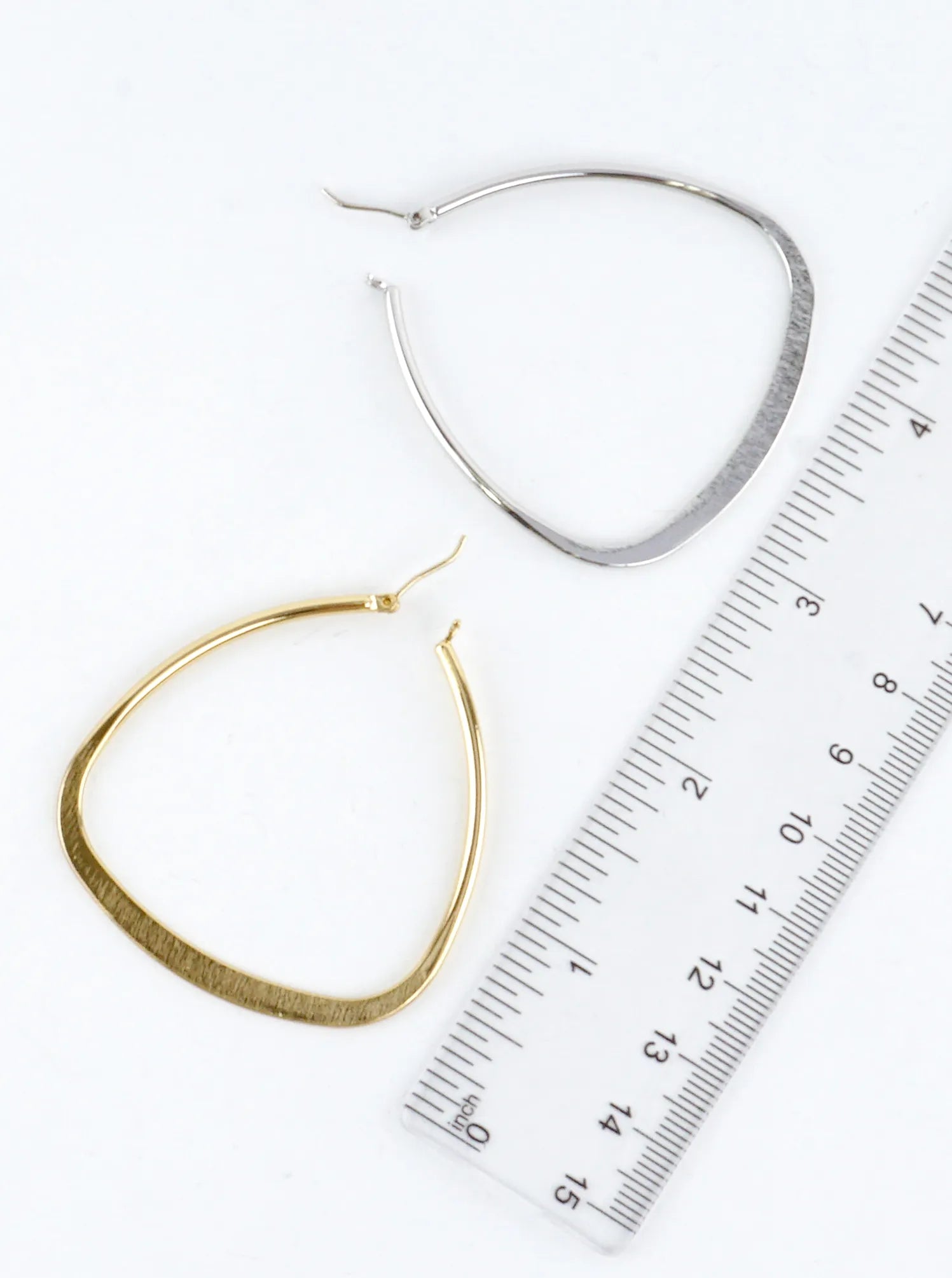 Polished-Triangular-Brass-Hoop-Earrings-151-SE12292-GLD-1-0M02BA04034226K0610.jpg