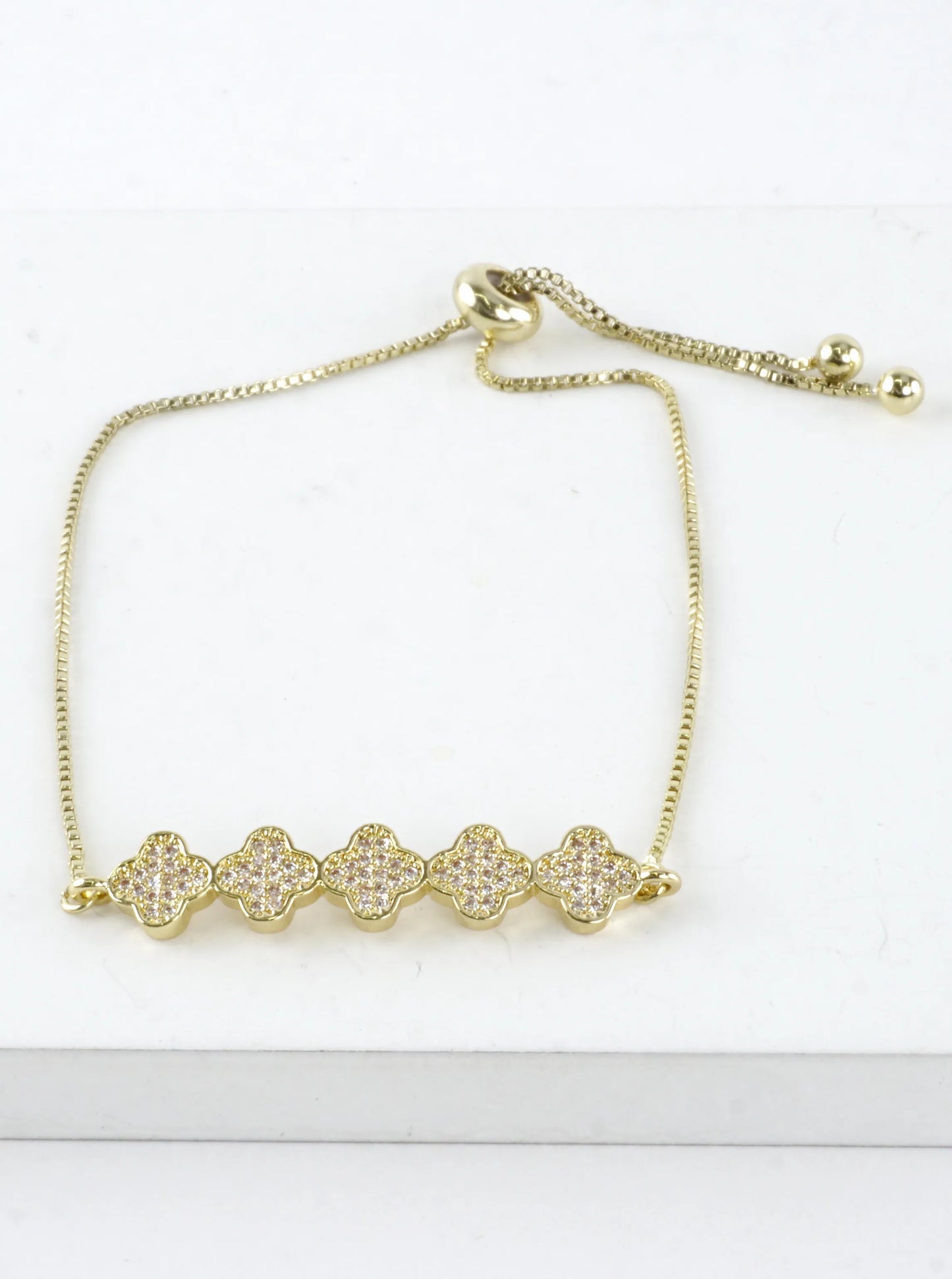 Quatrefoil CZ Pave Brass Pull Tie Bracelet