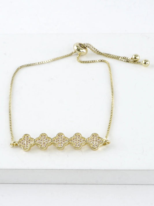 Quatrefoil CZ Pave Brass Pull Tie Bracelet