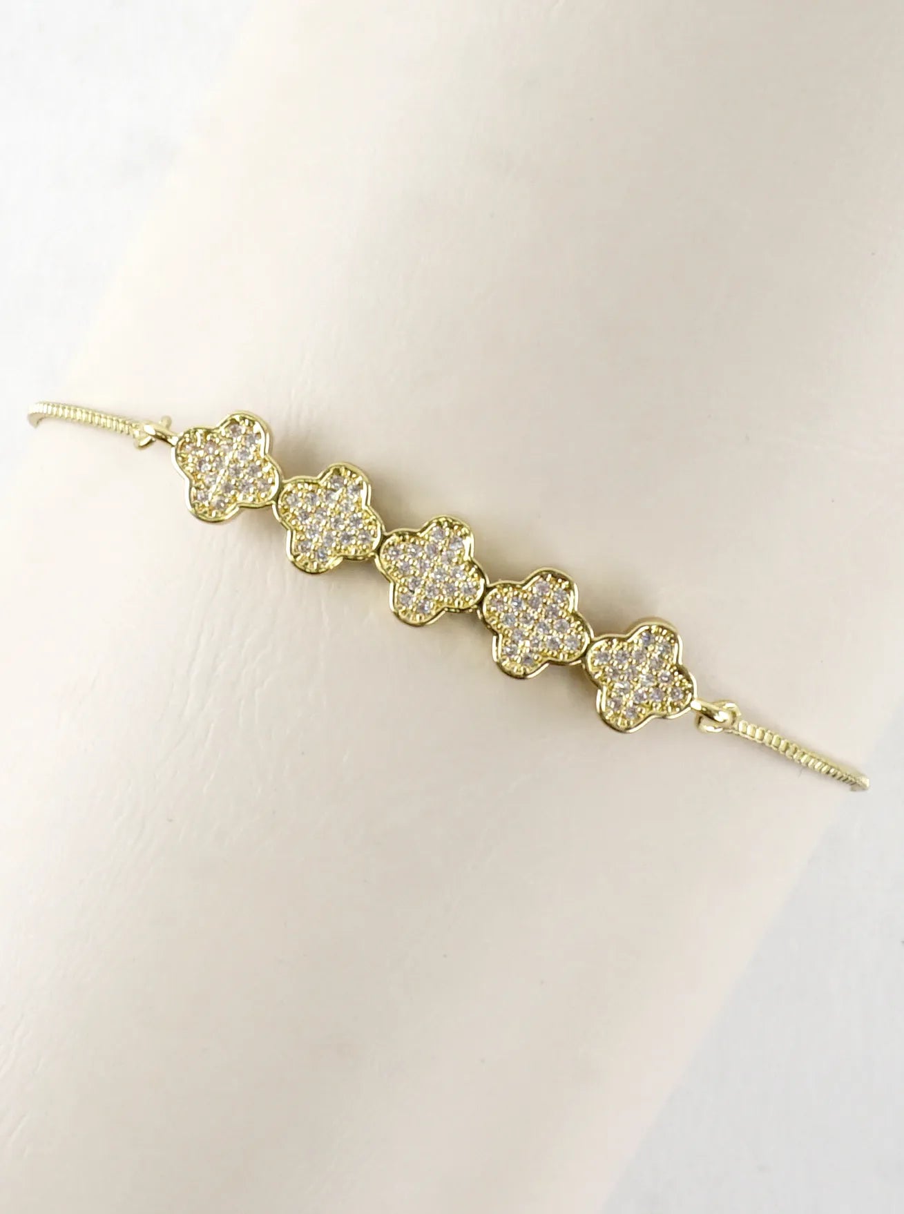 Quatrefoil CZ Pave Brass Pull Tie Bracelet