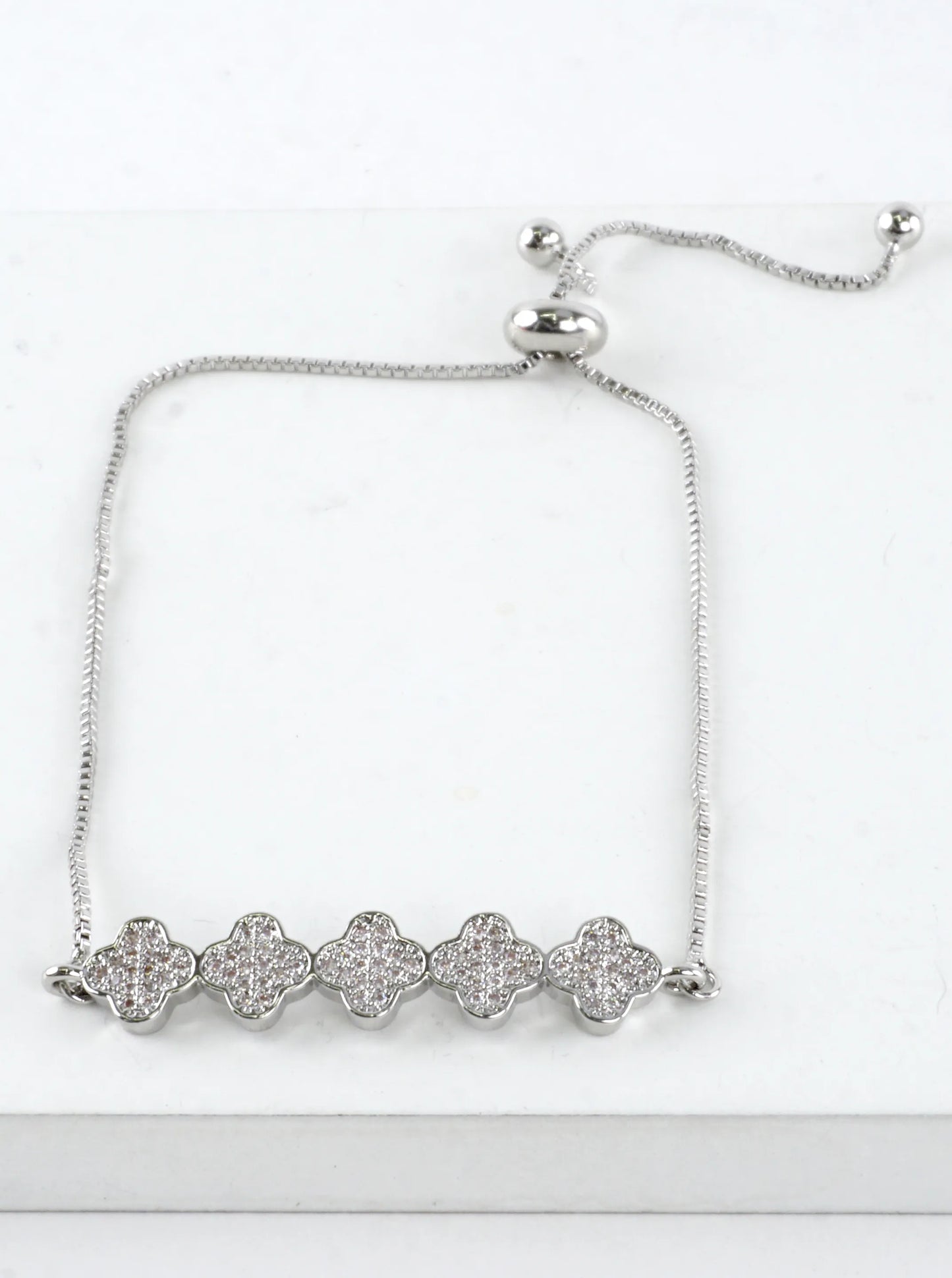 Quatrefoil CZ Pave Brass Pull Tie Bracelet