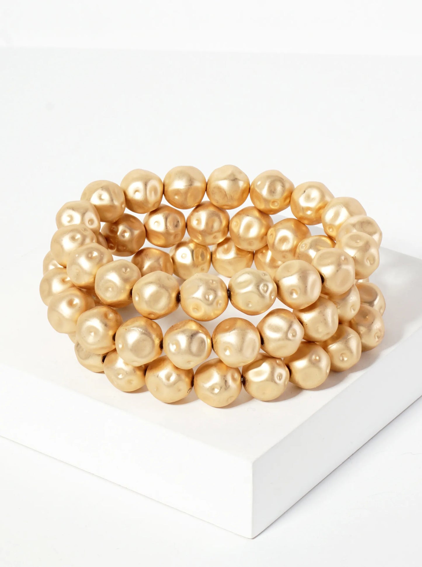 Set Of 3 Textured Metallic Beaded Stackable Stretch Bracelet