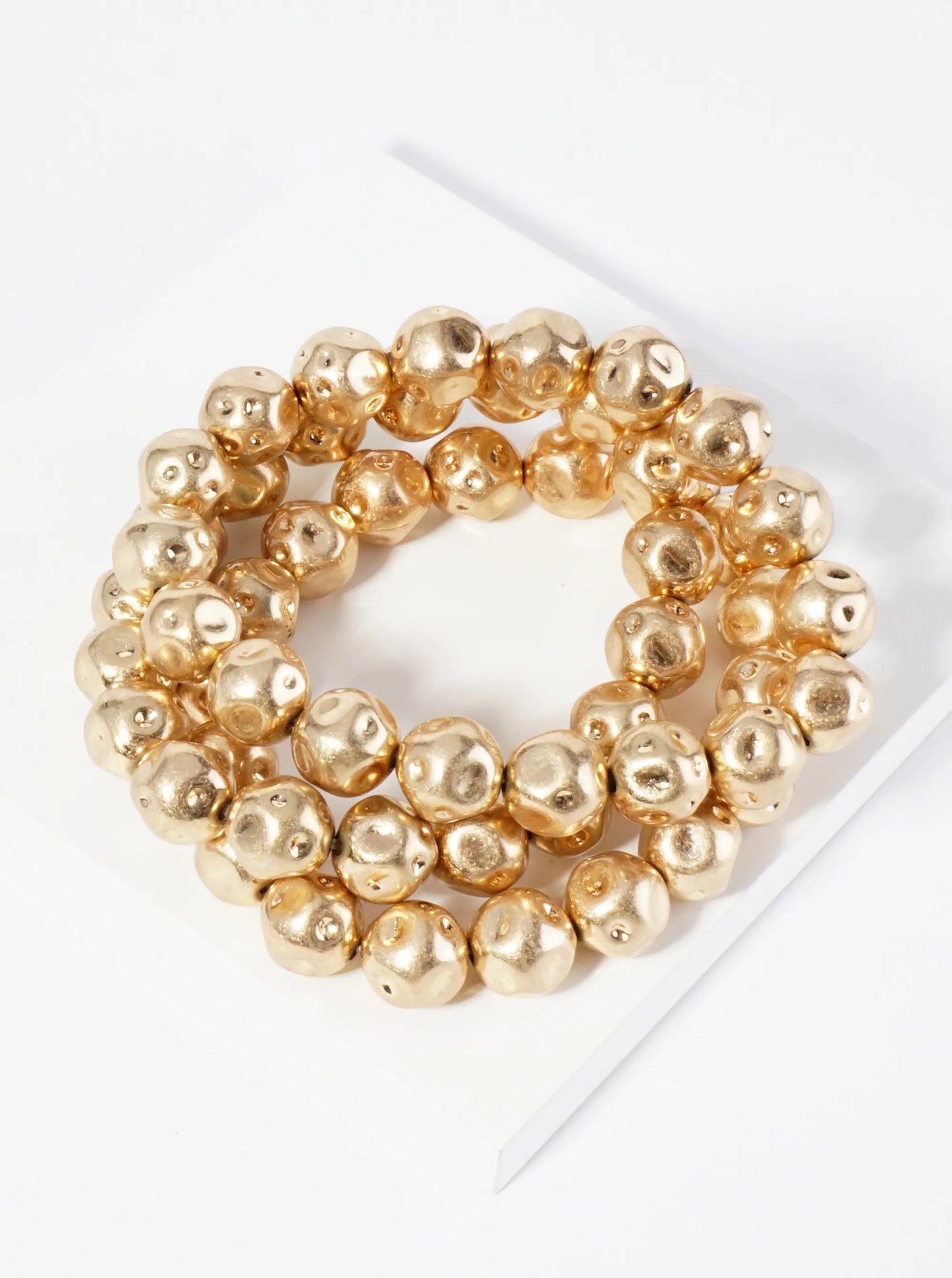 Set Of 3 Textured Metallic Beaded Stackable Stretch Bracelet