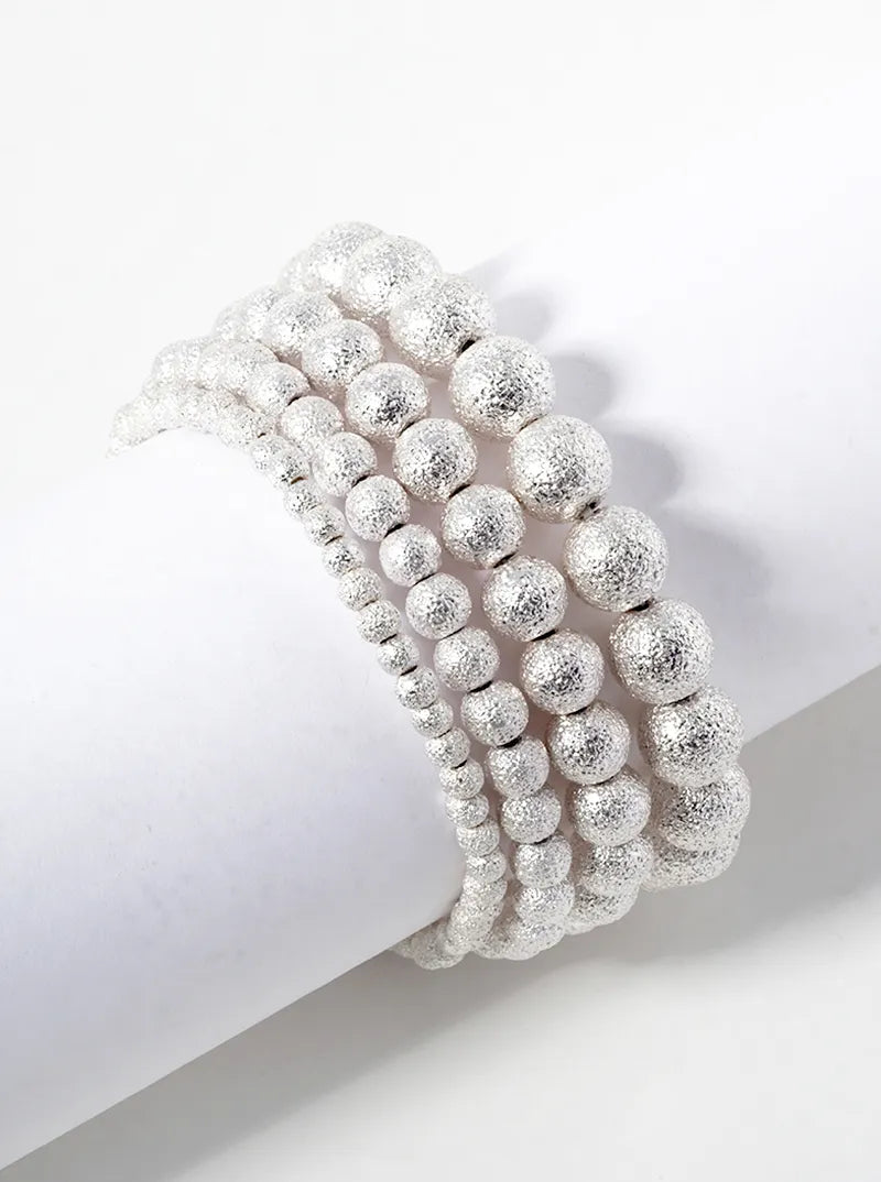 Set Of 4 4-10mm Textured Beads Stretch Stackable Bracelet