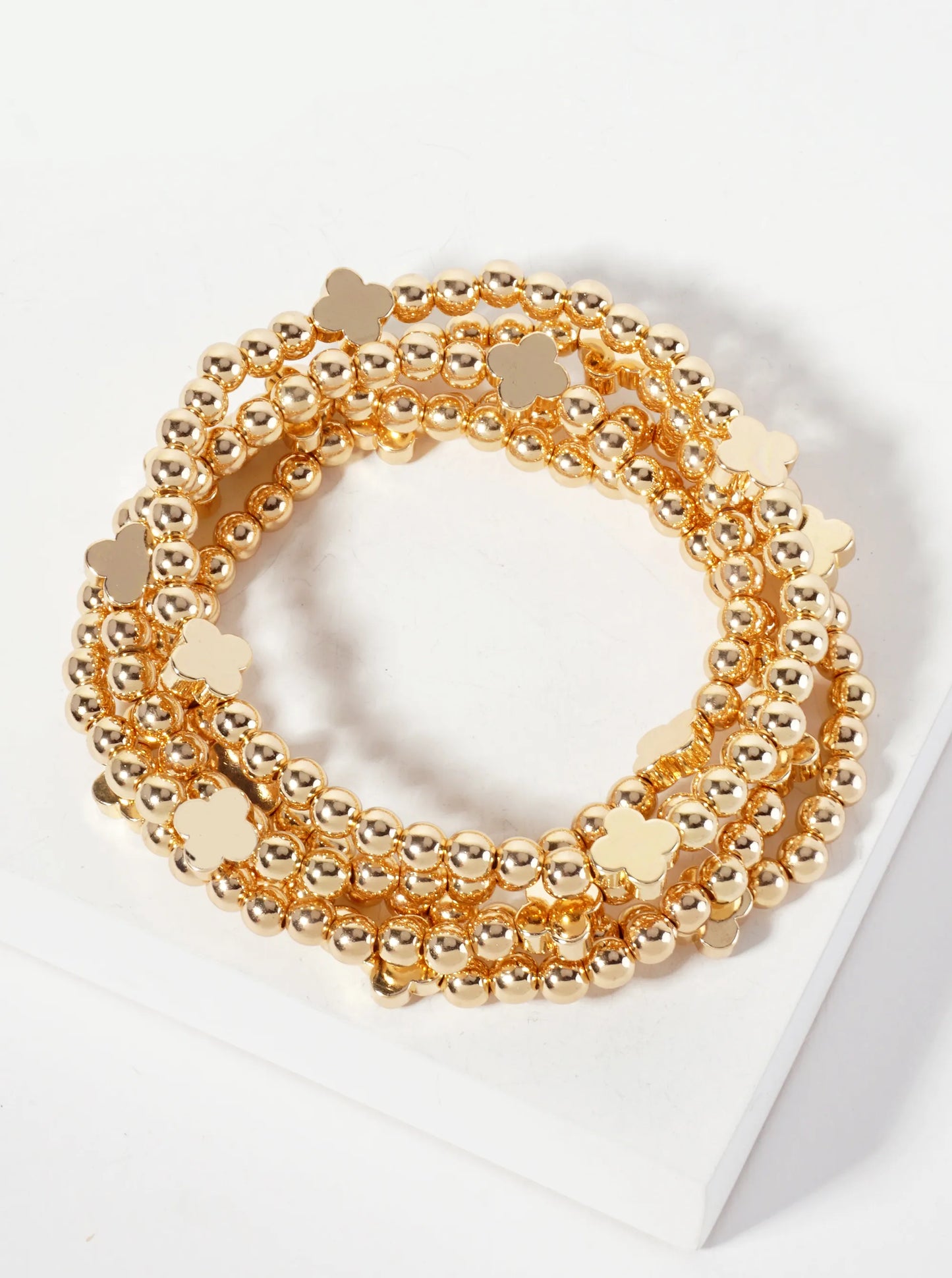 Set-of-5 Polished Metallic Quatrefoil And Ball-Beads Stackable Stretch Bracelet