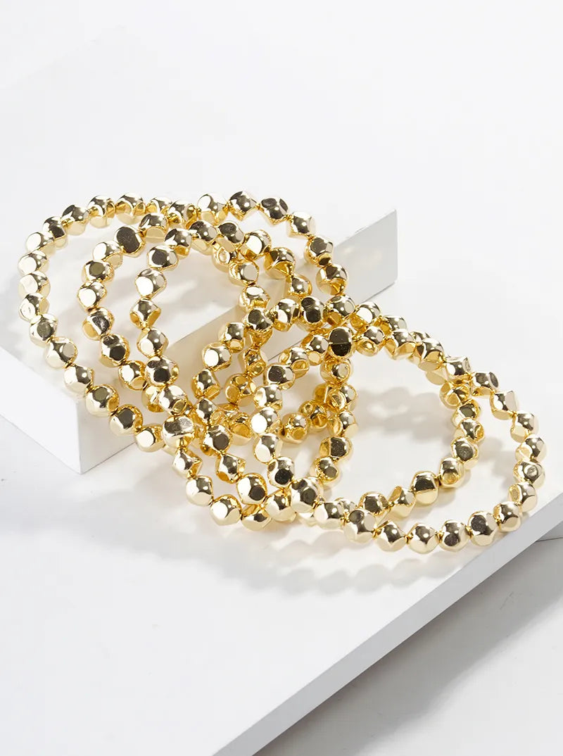 Set Of 5 Metallic Bead Stackable Stretch Bracelet