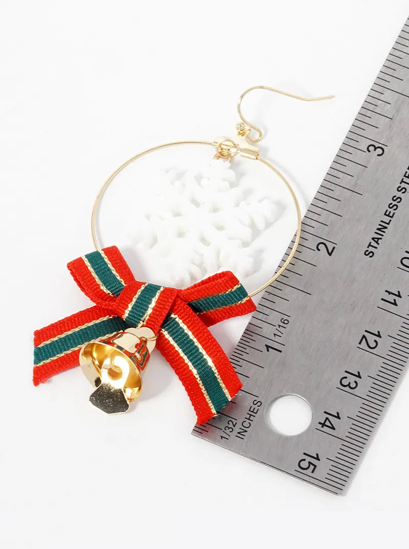 Snowflake Ribbon Bow And Jingle Bell Christmas Earrings
