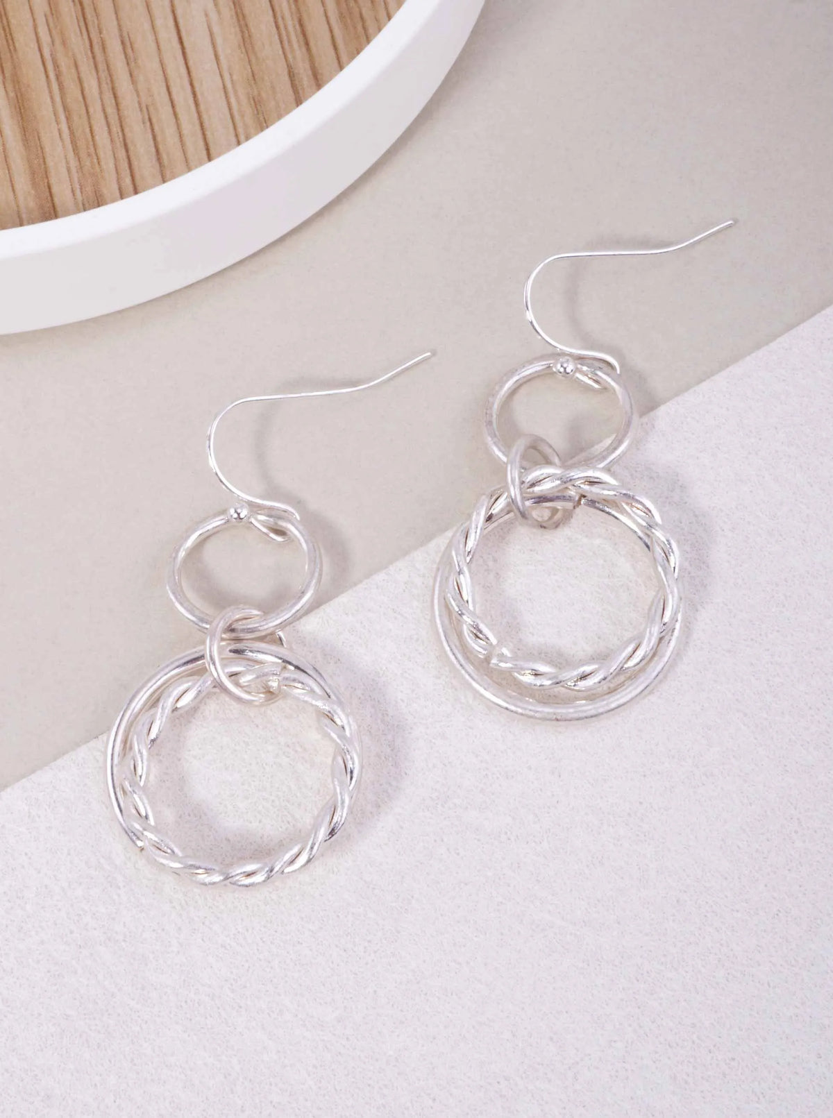 TWISTED TRIPLE CIRCLE WORN HOOK DROP EARRINGS
