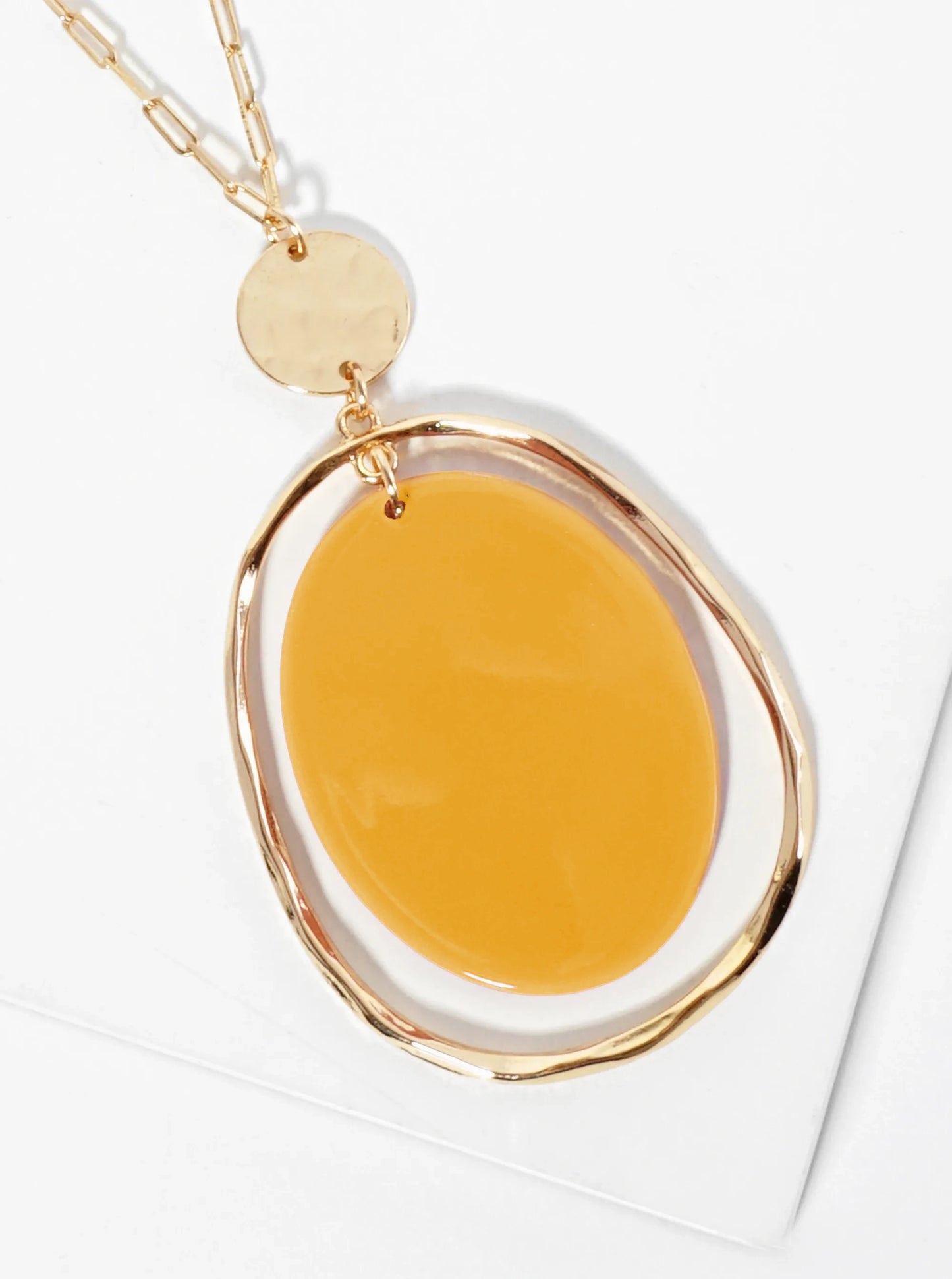 Textured Circle Encasing An Acetate Oval Pendant 30 Inch Long Necklace