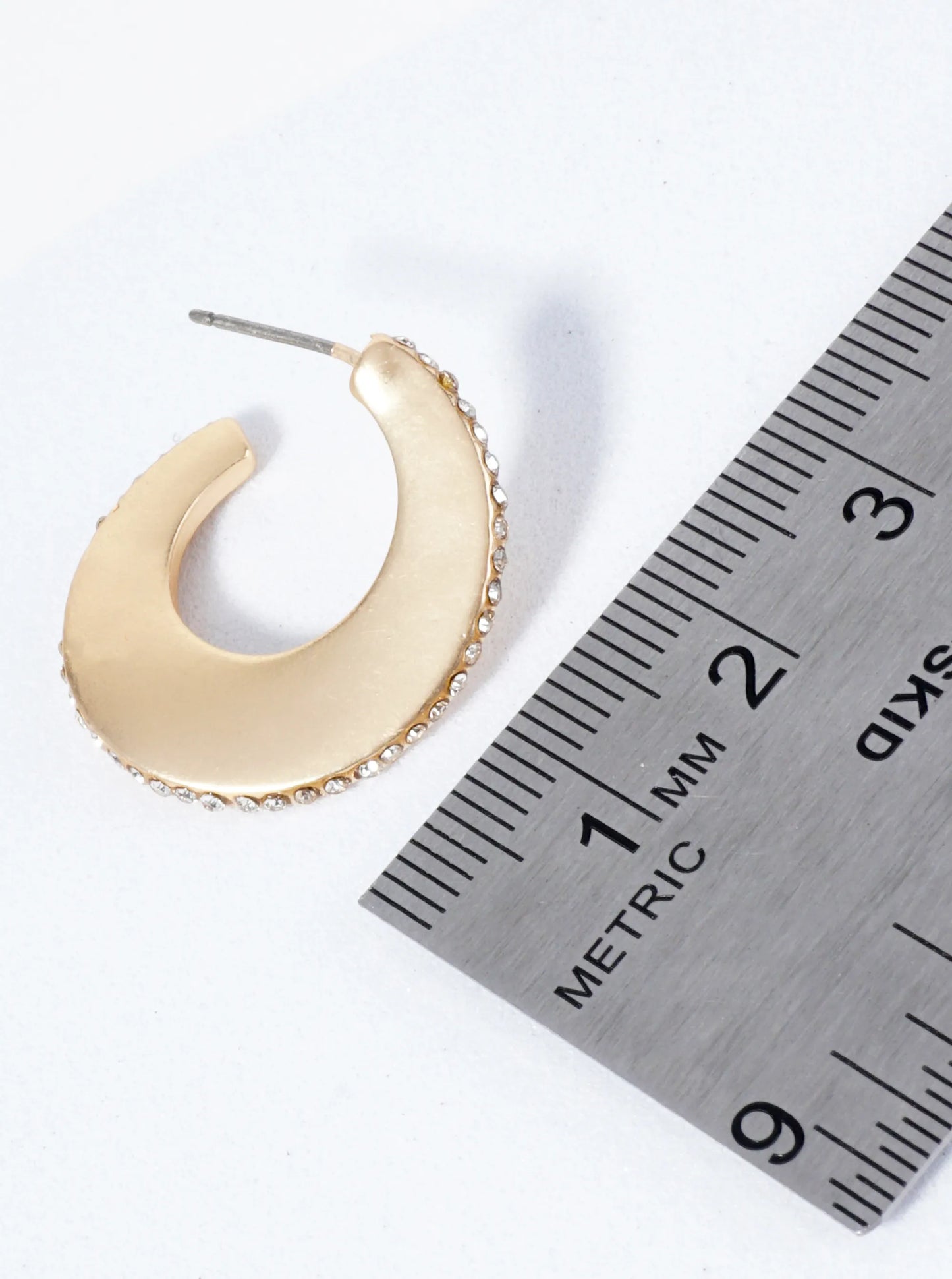 Wavy Hoop Earrings Embellished With Closely Set Stones