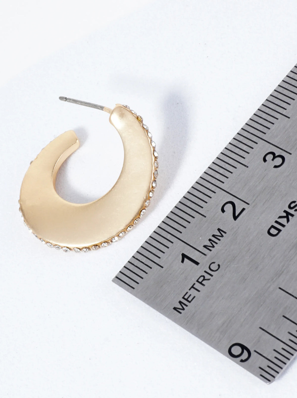 Wavy Hoop Earrings Embellished With Closely Set Stones