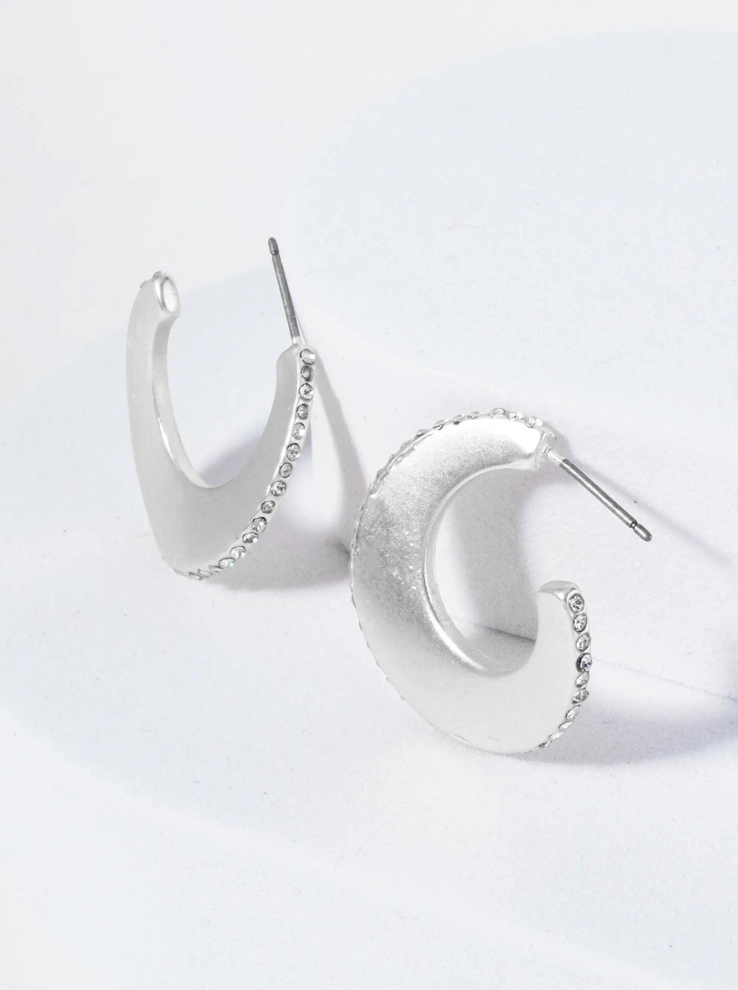 Wavy Hoop Earrings Embellished With Closely Set Stones