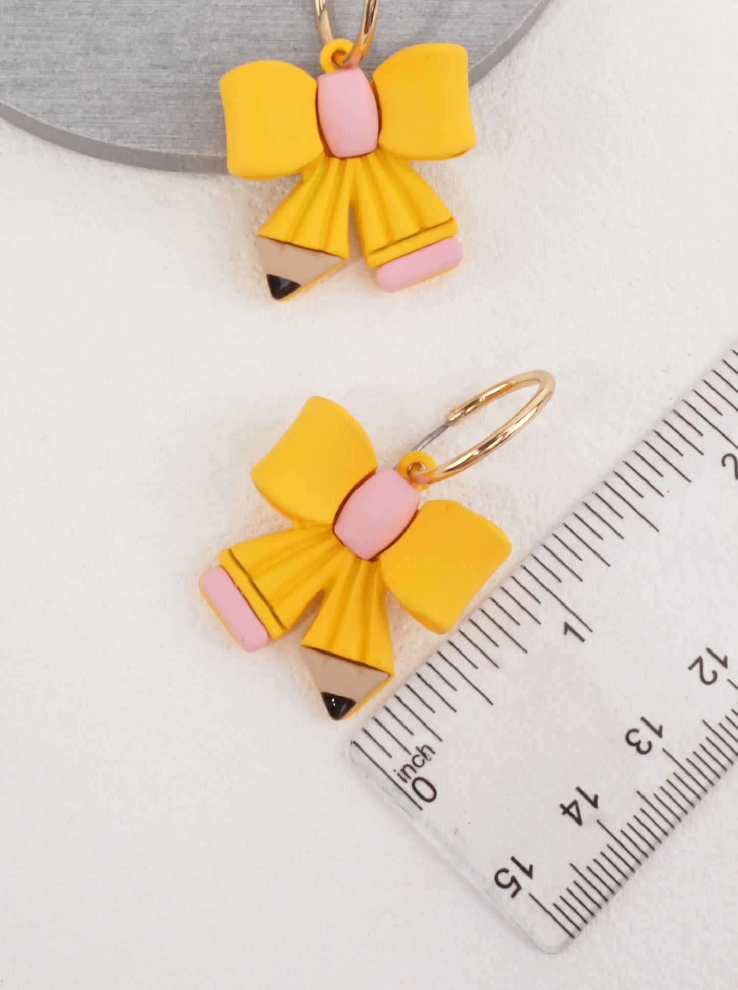 Whimsical Pencil Bow Huggie Earrings