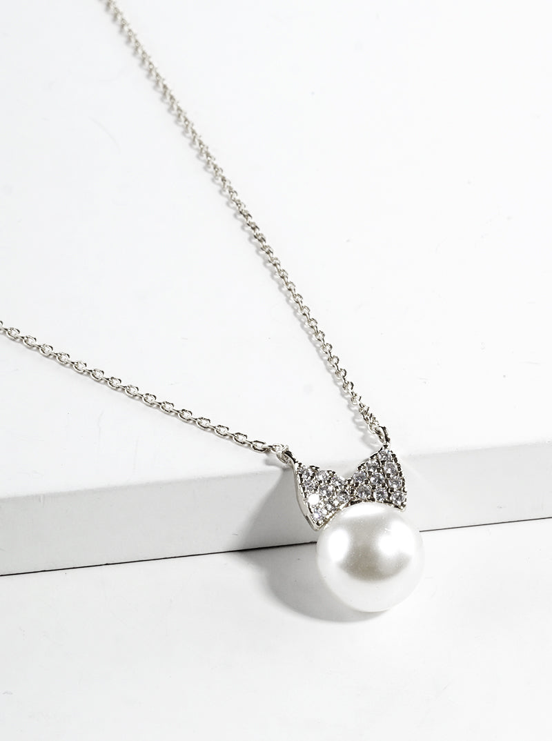 White Gold Dipped CZ Pave Ribbon Bow Pearl Pendant Necklace