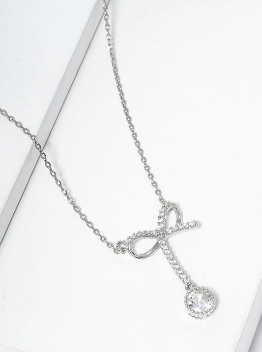 White Gold Dipped CZ Pave Ribbon Bow With Star Drop Pendant Necklace