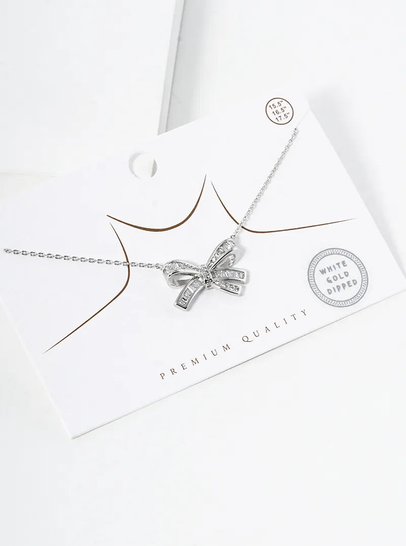 White Gold Dipped CZ Pave Ribbon Bow Pendant Necklace