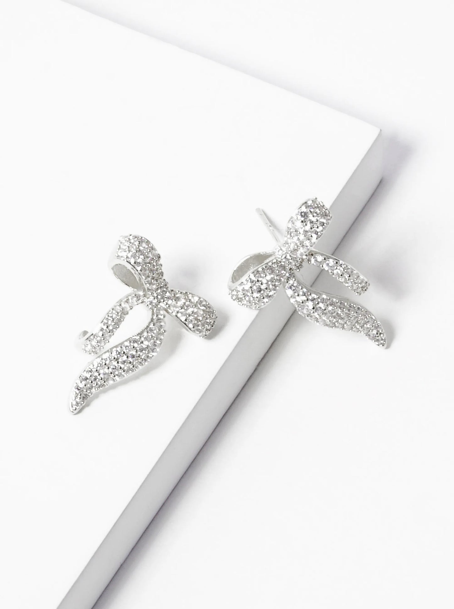 White Gold Dipped CZ Pave Ribbon Bow Stud Earrings