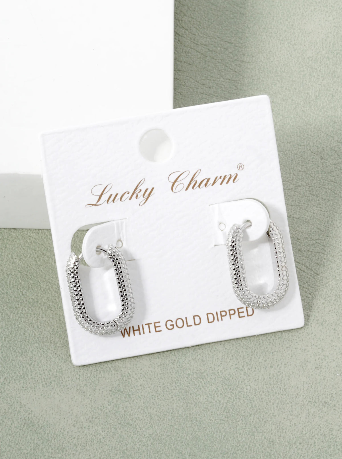 White Gold Dipped Textured 20mm Oval Hoop Earrings